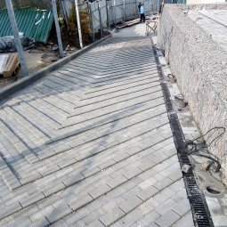 изготовление отверстий в отмостке 